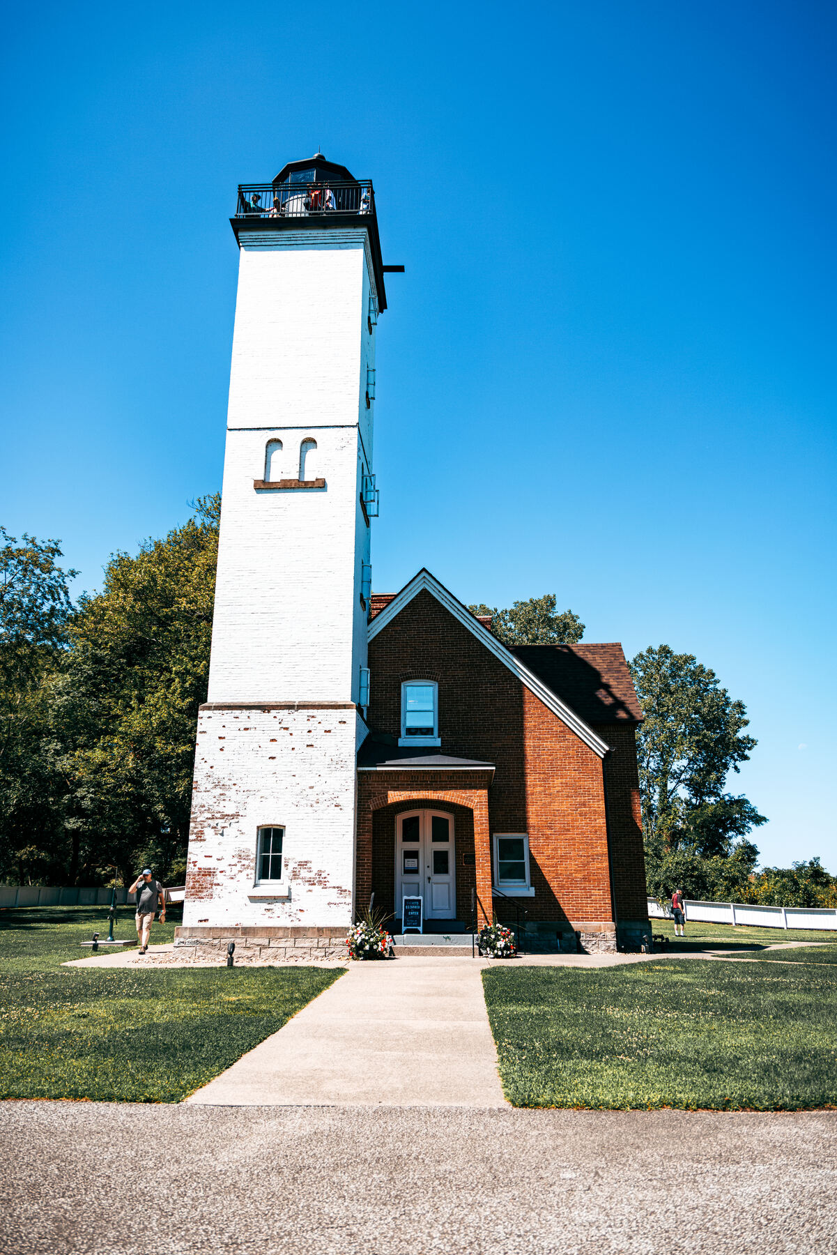 The Erie Land Lighthouse against a clear blue sky
