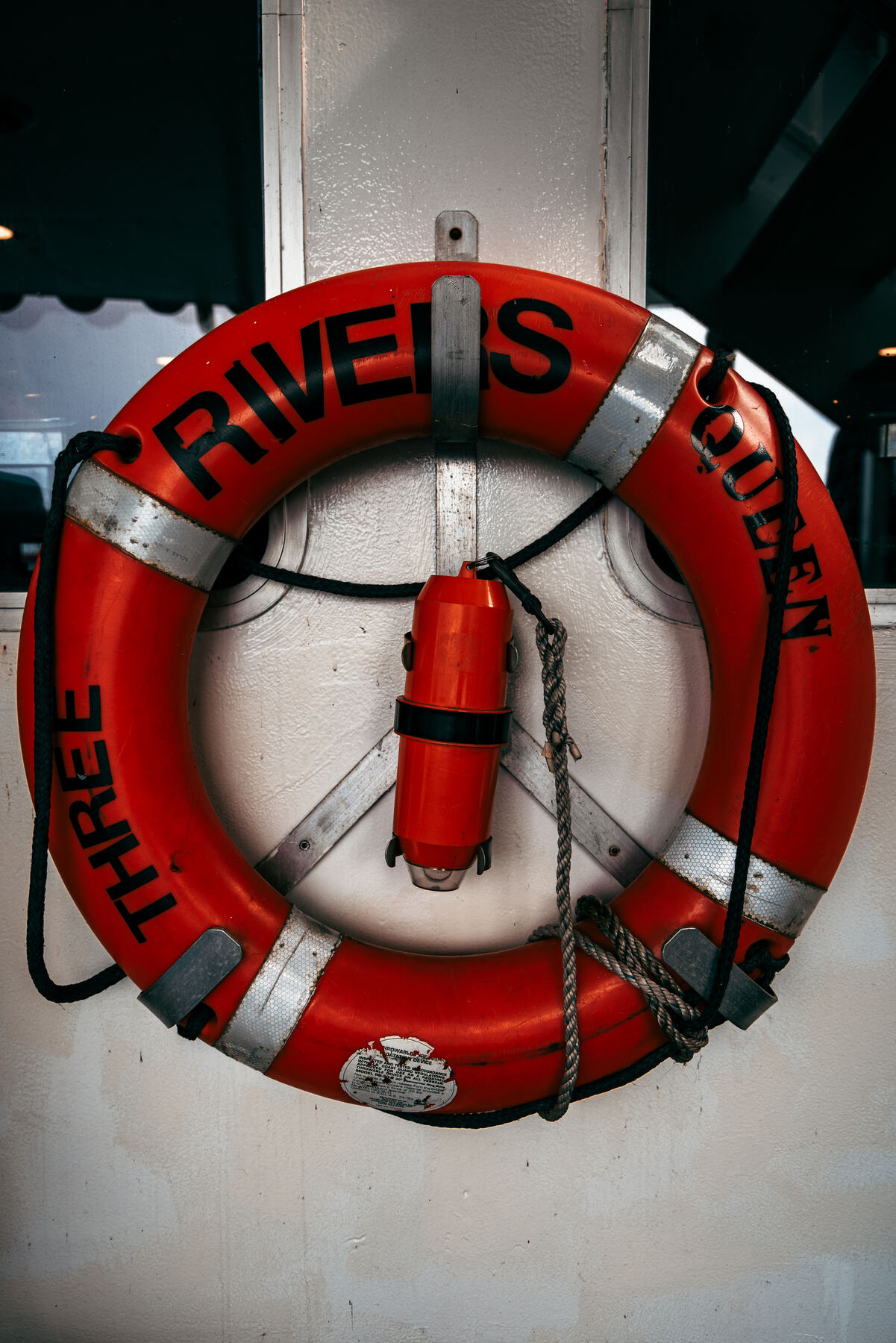 A red and white Three Rivers life preserver ring aboard the Gateway Clipper